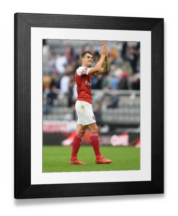 Framed Print : Granit Xhaka Celebrates with Arsenal Fans after Newcastle United Victory