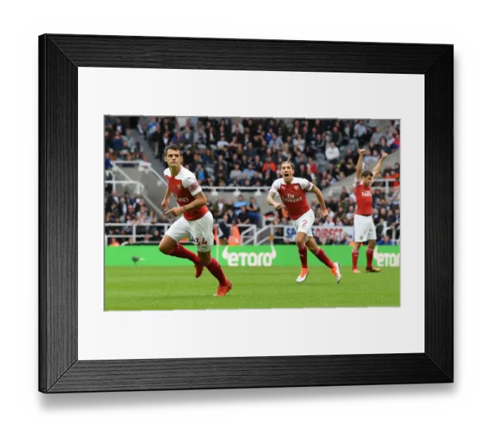 Framed Print : Xhaka and Bellerin Celebrate Arsenal's First Goal Against Newcastle United (2018-19) Framed Print : Xhaka and Bellerin Celebrate Arsenal's First Goal Against Newcastle United (2018-19)