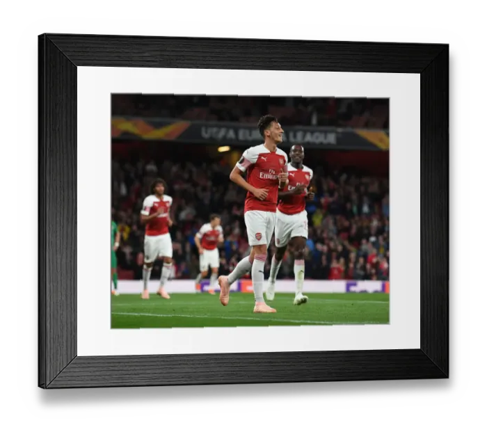 Framed Print : Mesut Ozil Scores Fourth Goal: Arsenal's Europa League Victory over Vorskla Poltava (2018-19)