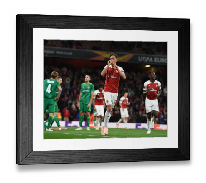 Framed Print : Mesut Ozil Scores Fourth Goal: Arsenal vs Vorskla Poltava, UEFA Europa League 2018-19