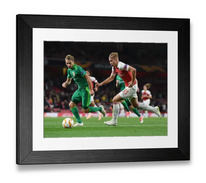 Framed Print : Emile Smith Rowe vs Vladyslav Kulach: Battle in Arsenal's Europa League Clash with Vorskla Poltava