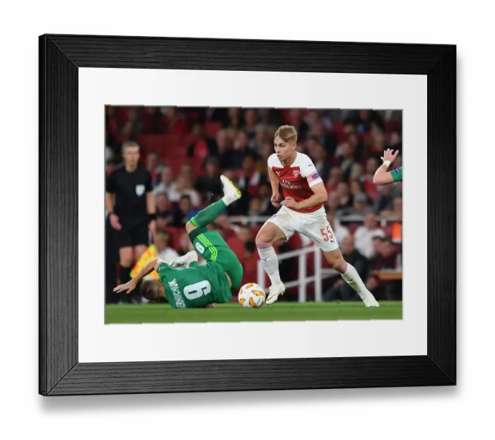 Framed Print : Emile Smith Rowe vs Mykhailo Serhiichuk: Clash in Arsenal's Europa League Match against Vorskla Poltava
