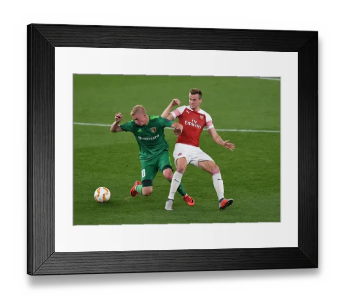 Framed Print : Rob Holding Stops Vladyslav Kulach in Arsenal's Europa League Clash