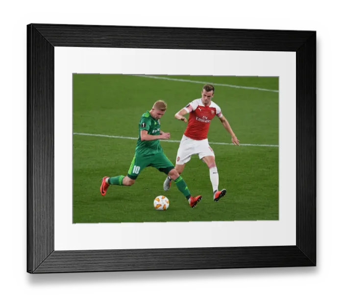 Framed Print : Rob Holding Stops Vladyslav Kulach: Arsenal's Defensive Standout Moment vs Vorskla Poltava in Europa League Framed Print : Rob Holding Stops Vladyslav Kulach: Arsenal's Defensive Standout Moment vs Vorskla Poltava in Europa League