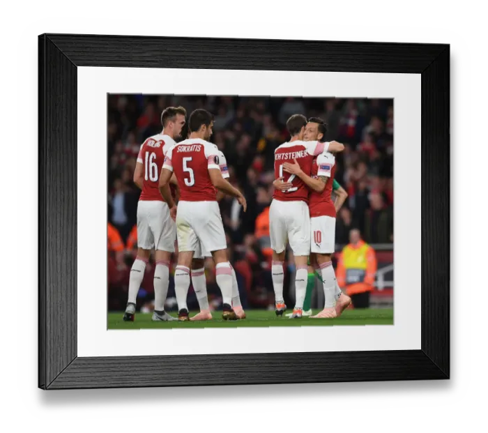 Framed Print : Arsenal's Ozil and Lichtsteiner: Celebrating Goals in Europa League Victory