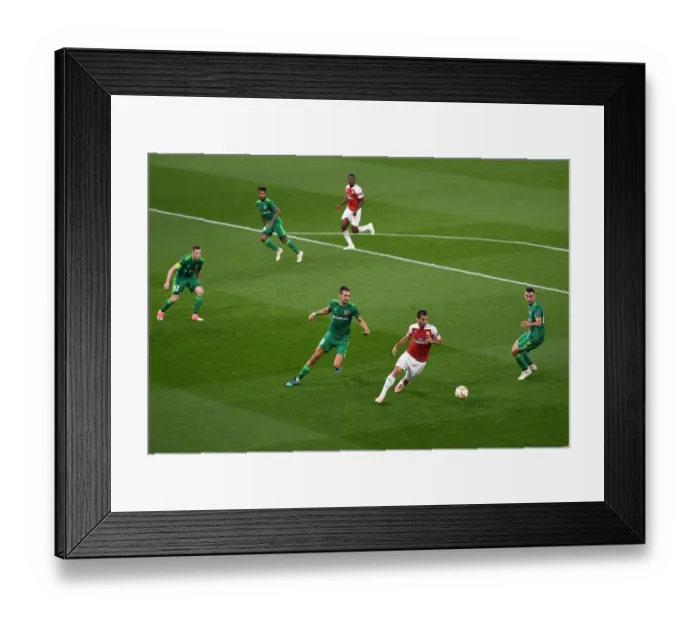 Framed Print : Arsenal's Mkhitaryan Clashes with Vorskla's Sharpar in Europa League Clash