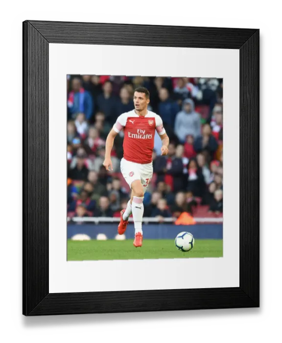 Framed Print : Granit Xhaka: Arsenal Midfielder in Action against Everton, Premier League 2018-19