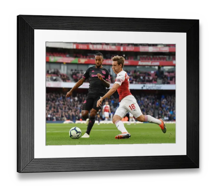 Framed Print : Monreal vs Walcott: Clash of the Wings in Arsenal v Everton Premier League Showdown Framed Print : Monreal vs Walcott: Clash of the Wings in Arsenal v Everton Premier League Showdown