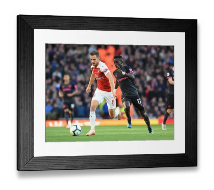 Framed Print : Arsenal's Aaron Ramsey Clashes with Everton's Idrissa Gueye in Premier League Showdown Framed Print : Arsenal's Aaron Ramsey Clashes with Everton's Idrissa Gueye in Premier League Showdown