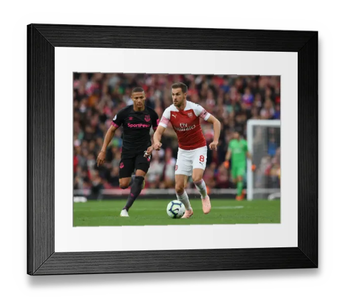 Framed Print : Arsenal's Aaron Ramsey Faces Off Against Everton's Richarlison in Intense Premier League Clash