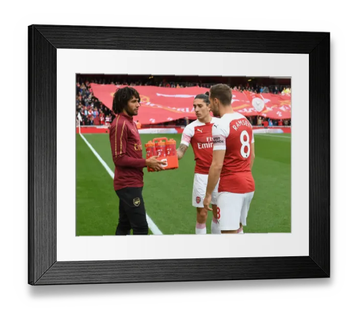 Framed Print : Arsenal Team Camaraderie: Elneny Supplies Drinks to Ramsey and Bellerin Before Arsenal v Everton Match