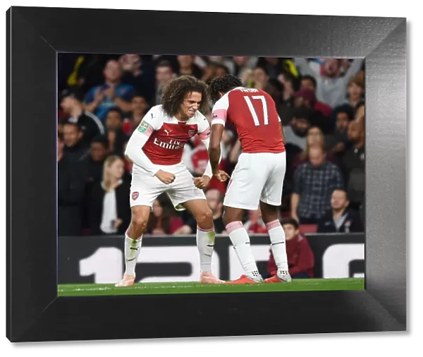 Arsenal's Guendouzi and Iwobi: Celebrating Their Second Goal in Carabao Cup Match