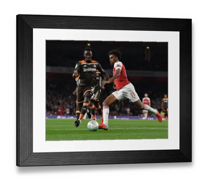 Framed Print : Alex Iwobi's Slick Moves: Outmaneuvering Moses Odubajo in Arsenal's Carabao Cup Victory