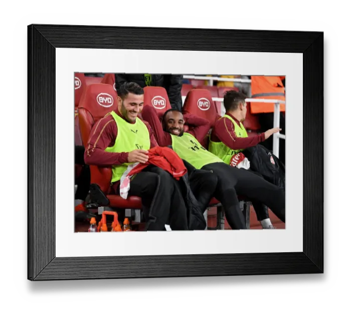 Framed Print : Arsenal's Roaring Striker: Alexandre Lacazette Readies for Arsenal vs. Brentford Showdown