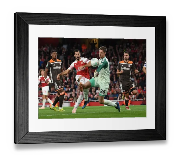 Framed Print : Mkhitaryan Faces Off Against Daniels in Carabao Cup Clash: Arsenal vs Brentford Framed Print : Mkhitaryan Faces Off Against Daniels in Carabao Cup Clash: Arsenal vs Brentford
