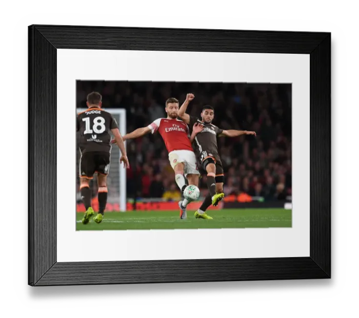 Framed Print : Mustafi vs Maupay: Clash at the Emirates - Arsenal vs Brentford, Carabao Cup 2018-19