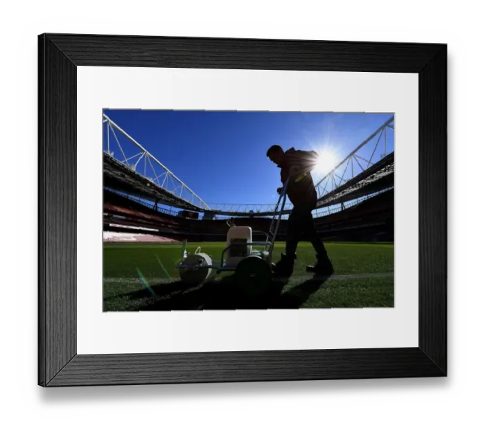 Framed Print : Arsenal Groundsman's Precision: Perfecting the Carabao Cup Pitch against Brentford