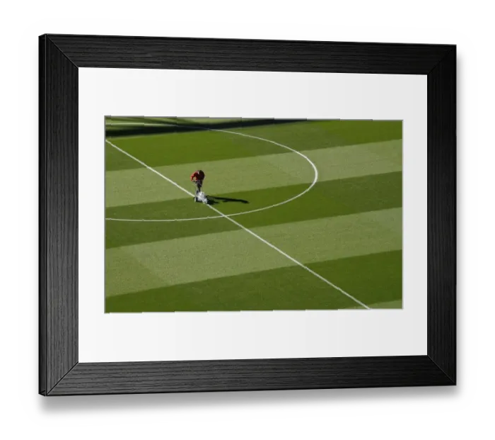 Framed Print : Arsenal: Groundsman Prepares Pitch for Carabao Cup Clash against Brentford