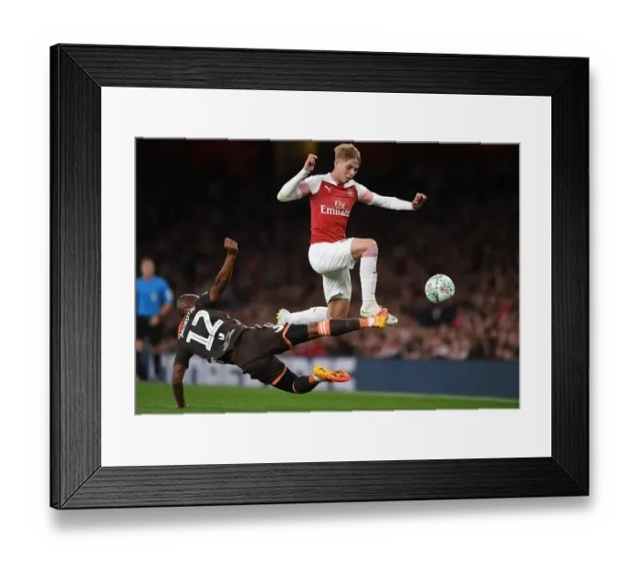 Framed Print : Clash of Midfield Titans: Emile Smith Rowe vs. Kamohelo Mokotjo - Arsenal's Carabao Cup Showdown