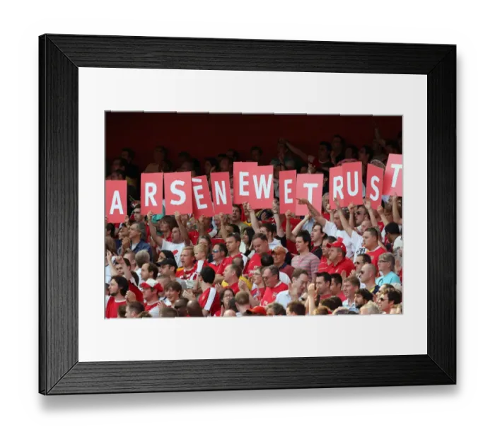 Framed Print : Arsenal fans show their support for the Manager