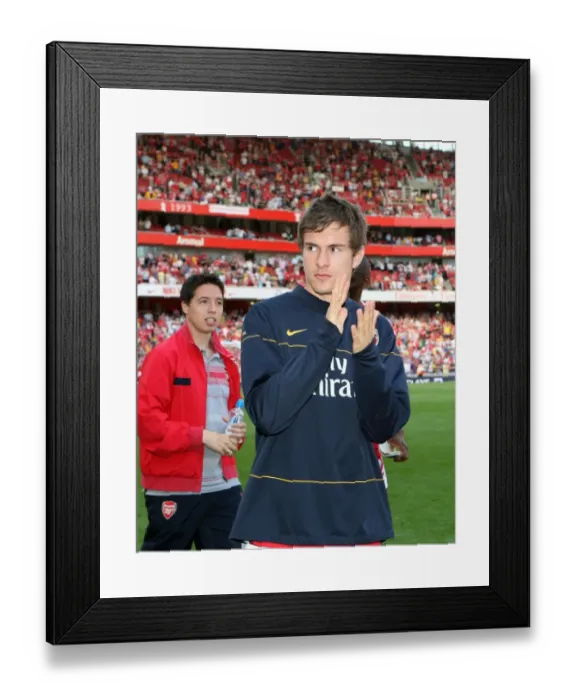 Framed Print : Aaron Ramsey (Arsenal) claps the fans after the match