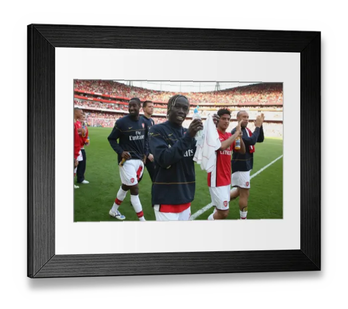 Framed Print : Arsenal Victory: Sagna, Vela, Djourou, and Silvestre Celebrate with Fans after 4-1 Win over Stoke City Framed Print : Arsenal Victory: Sagna, Vela, Djourou, and Silvestre Celebrate with Fans after 4-1 Win over Stoke City