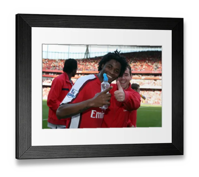 Framed Print : Alex Song and Amaury Bischoff (Arsenal) after the match