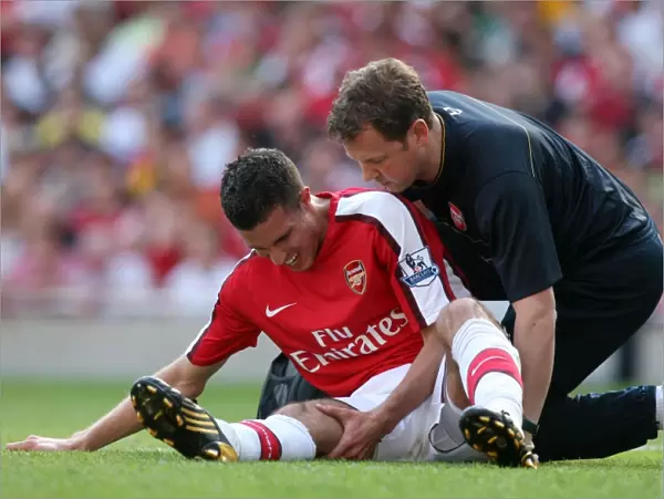 Robin van Persie (Arsenal) with Physio Colin Lewin