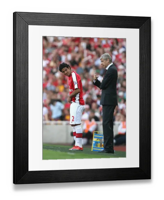 Framed Print : Arsenal manager Arsene Wenger with substitute Carlos Vela