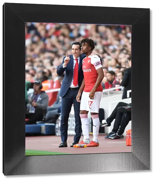 Unai Emery and Alex Iwobi: Arsenal FC's Dynamic Duo during Arsenal v Watford Match