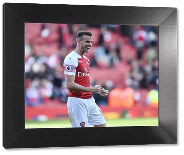 Rob Holding Celebrates Arsenal's Victory Over Watford in the Premier League