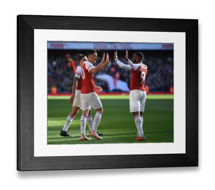Framed Print : Mesut Ozil and Alexandre Lacazette Celebrate Goals: Arsenal's Winning Moment Against Watford (2018-19)