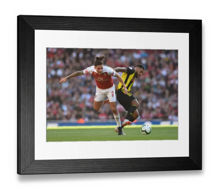 Framed Print : Clash at the Emirates: Hector Bellerin vs. Andre Gray in Arsenal's Battle Against Watford