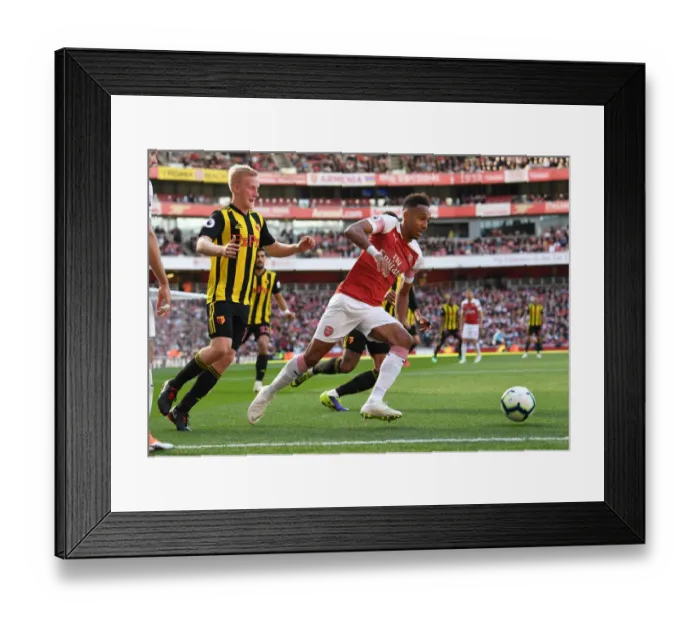 Framed Print : Arsenal's Aubameyang Clashes with Watford's Hughes in Premier League Showdown