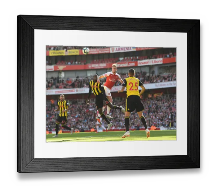 Framed Print : Clash at the Emirates: Rob Holding vs Abdoulaye Doucoure