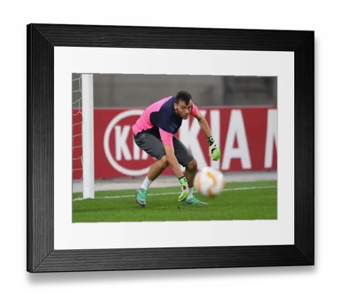 Framed Print : Arsenal's Dejan Iliev Warming Up Ahead of Qarabag Clash in Europa League