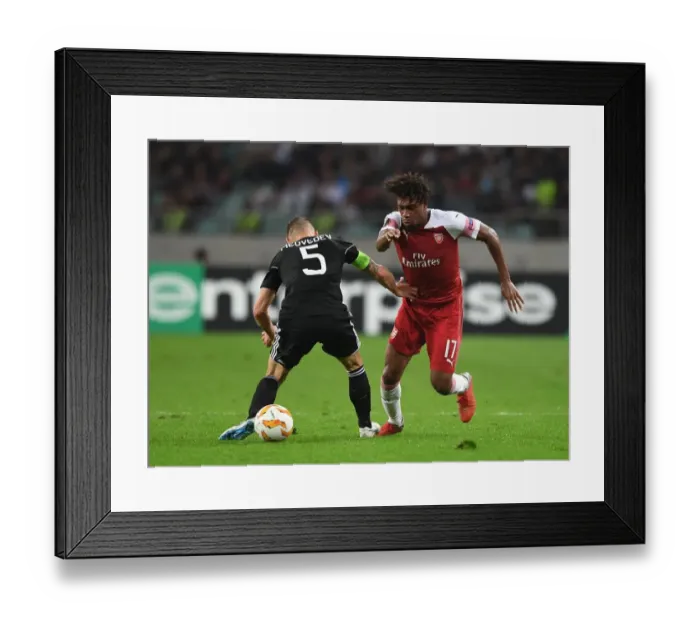Framed Print : Clash of the Players: Iwobi vs. Medvedev in Europa League Showdown Framed Print : Clash of the Players: Iwobi vs. Medvedev in Europa League Showdown