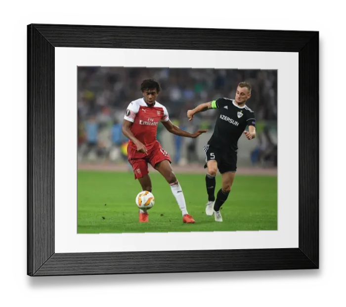 Framed Print : Clash of Styles: Alex Iwobi vs Maksim Medvedev in UEFA Europa League Showdown between Qarabag and Arsenal Framed Print : Clash of Styles: Alex Iwobi vs Maksim Medvedev in UEFA Europa League Showdown between Qarabag and Arsenal