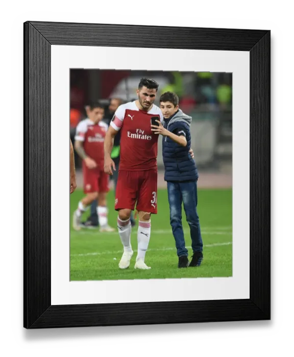 Framed Print : Sead Kolasinac Post-Match Interaction with Fans: Qarabag FK vs. Arsenal, UEFA Europa League, Group E (2018)