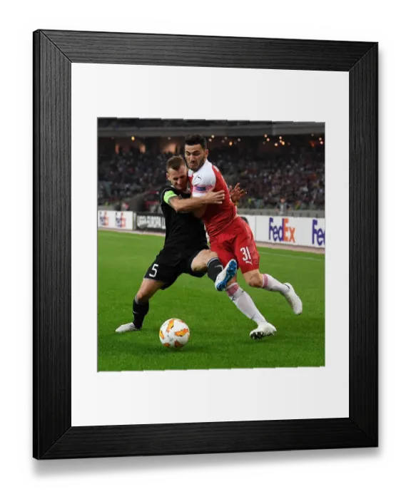 Framed Print : Clash of Kolasinac and Medvedev: A Battle in Baku's Europa League