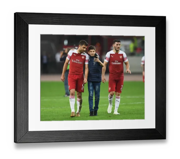 Framed Print : Sokratis Poses with Fans after Qarabag vs. Arsenal Europa League Match