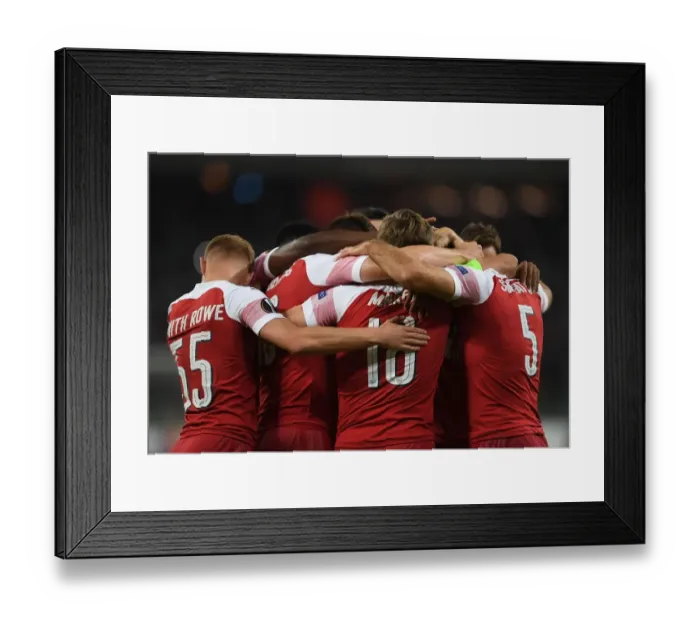 Framed Print : Sokratis Scores: Arsenal Celebrate in Qarabag