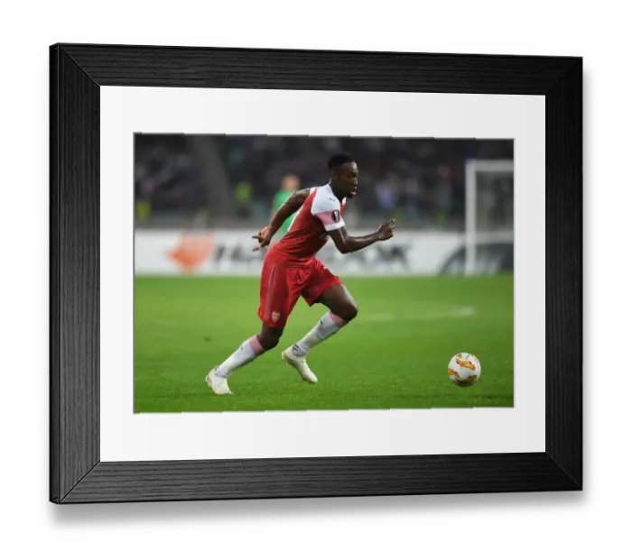 Framed Print : Arsenal's Europa League Showdown: Danny Welbeck Clashes with Qarabag's Michel in Baku