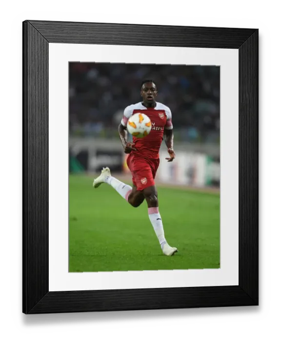Framed Print : Danny Welbeck Faces Micel of Qarabag in Arsenal's UEFA Europa League Clash