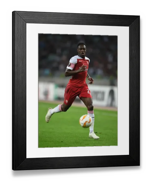 Framed Print : Danny Welbeck Faces Micel of Qarabag in Arsenal's Europa League Clash