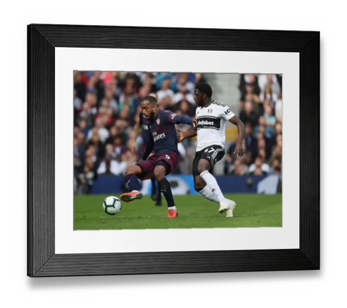 Framed Print : Arsenal's Alex Lacazette Faces Off Against Fulham's Aboubakar Kamara in Premier League Clash