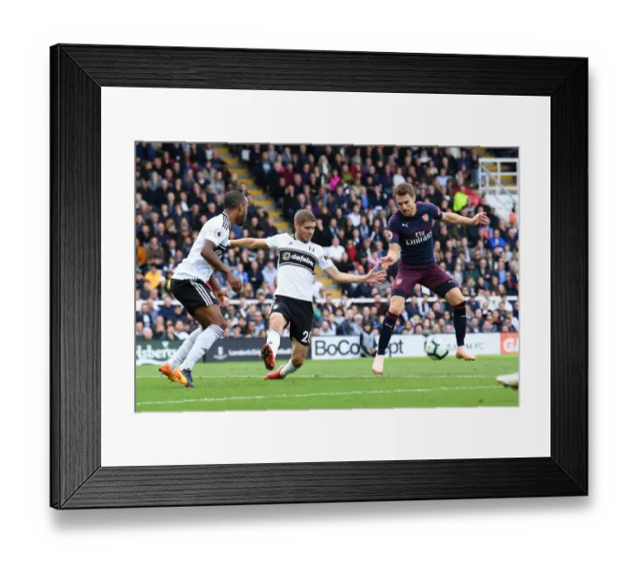 Framed Print : Aaron Ramsey Scores Third Goal Against Fulham Amid Pressure from Maxime Le Marchand Framed Print : Aaron Ramsey Scores Third Goal Against Fulham Amid Pressure from Maxime Le Marchand