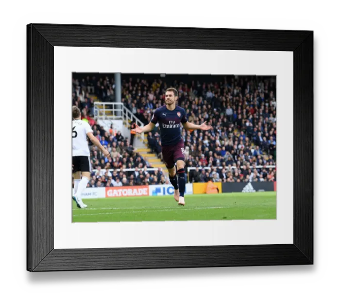 Framed Print : Aaron Ramsey's Hat-Trick: Arsenal Crushes Fulham in Premier League Framed Print : Aaron Ramsey's Hat-Trick: Arsenal Crushes Fulham in Premier League