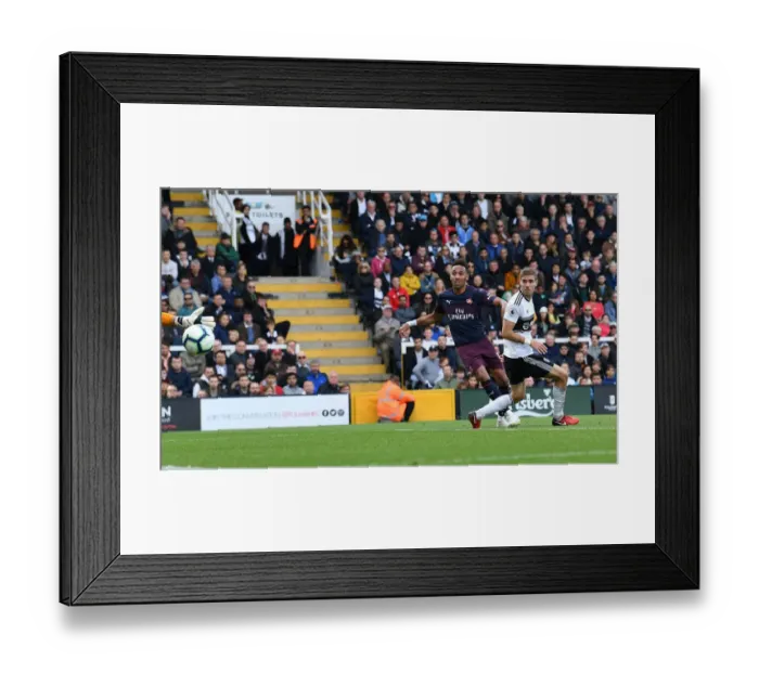 Framed Print : Aubameyang's Intense Goal: Arsenal's Fourth Amidst Fulham's Defensive Pressure Framed Print : Aubameyang's Intense Goal: Arsenal's Fourth Amidst Fulham's Defensive Pressure