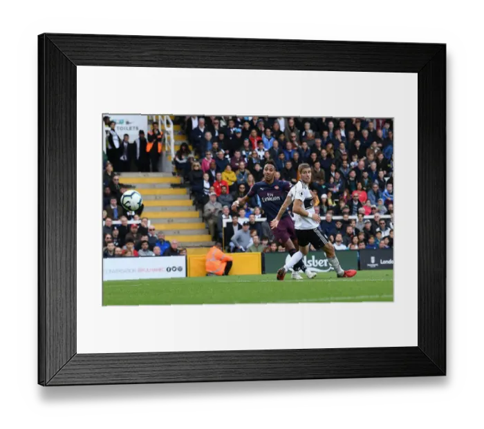 Framed Print : Aubameyang's Intense Goal: Arsenal's Fourth Amidst Fulham's Defensive Pressure